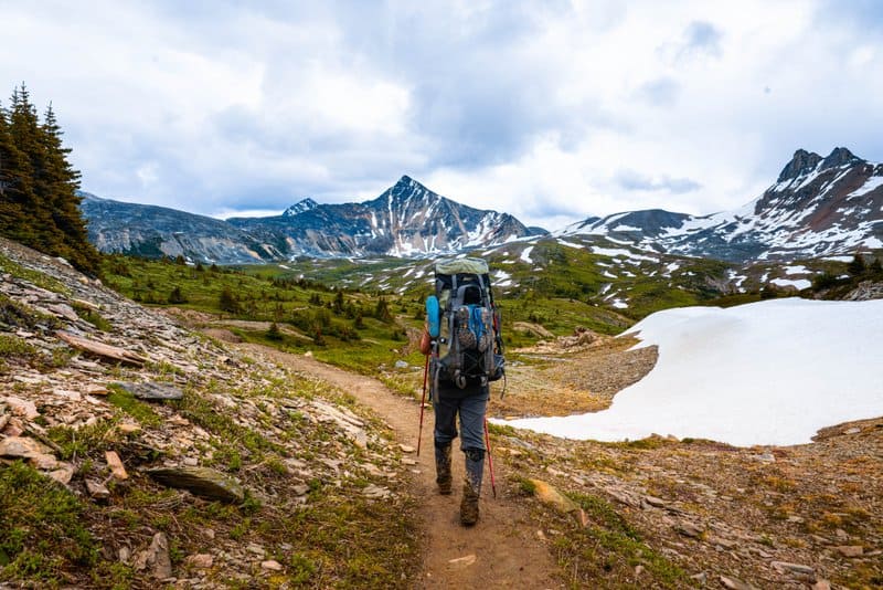 Male hiker on a trail in the mountains at Jasper National Park 