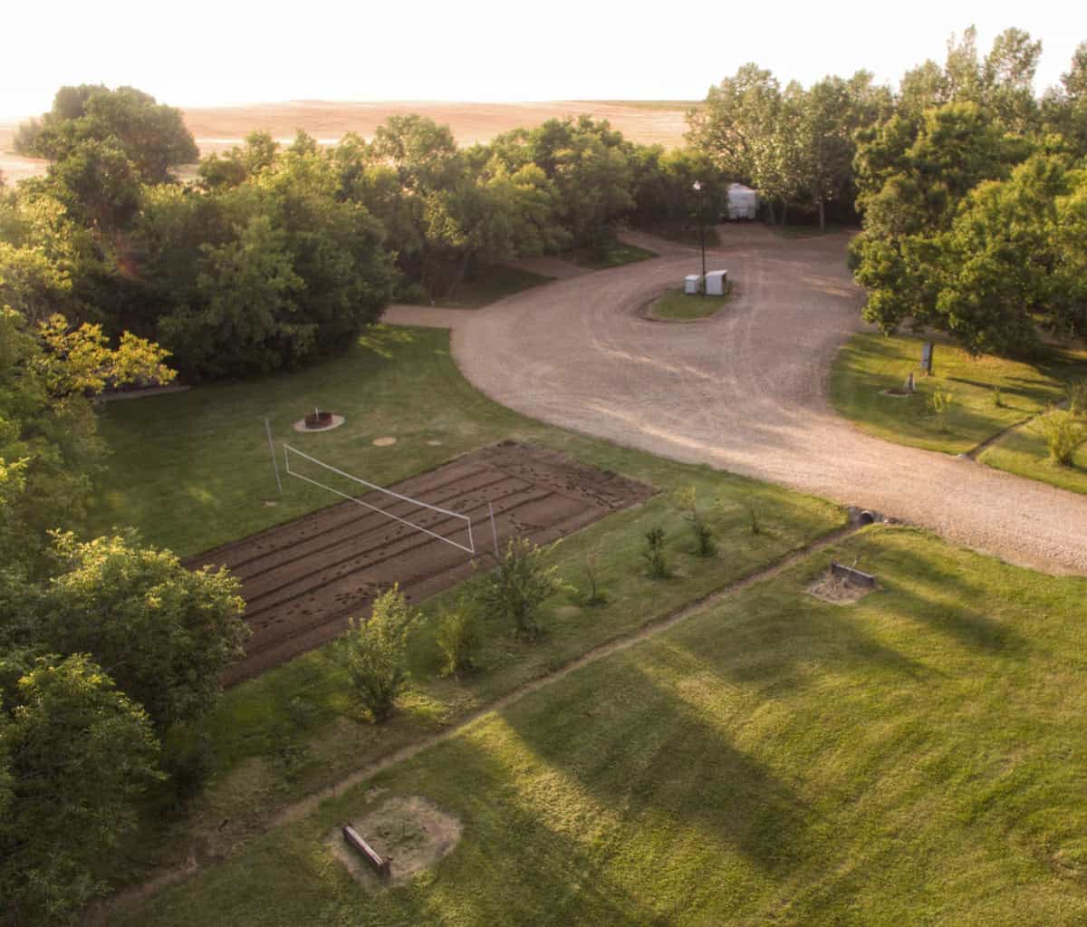 The beach volleyball court and view of the Kneehill Country Campground