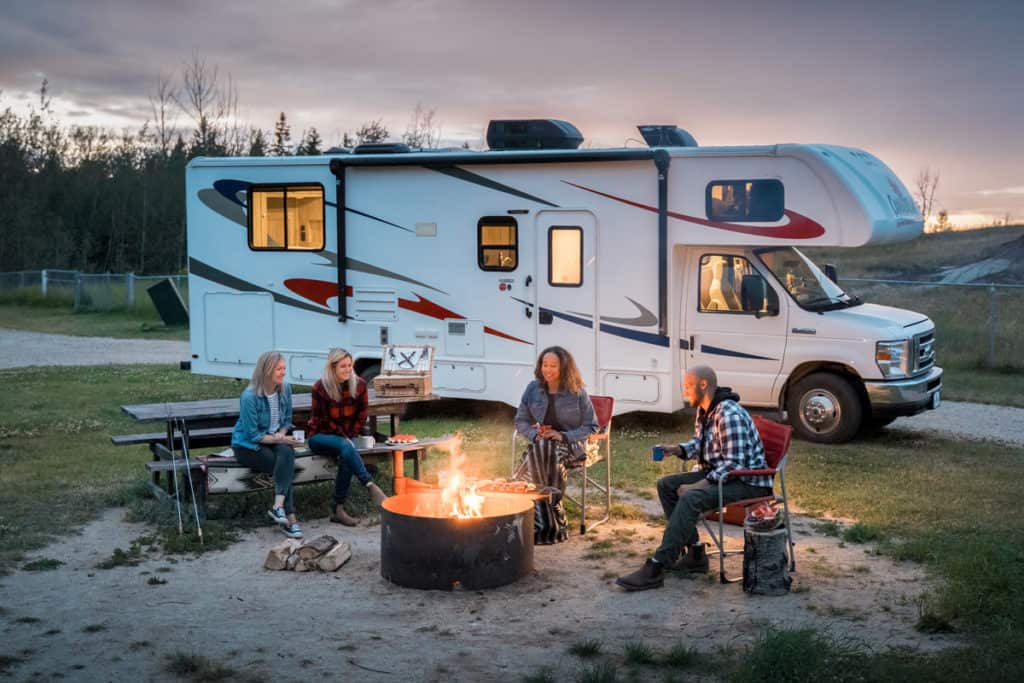 Campers around a fire in Alberta