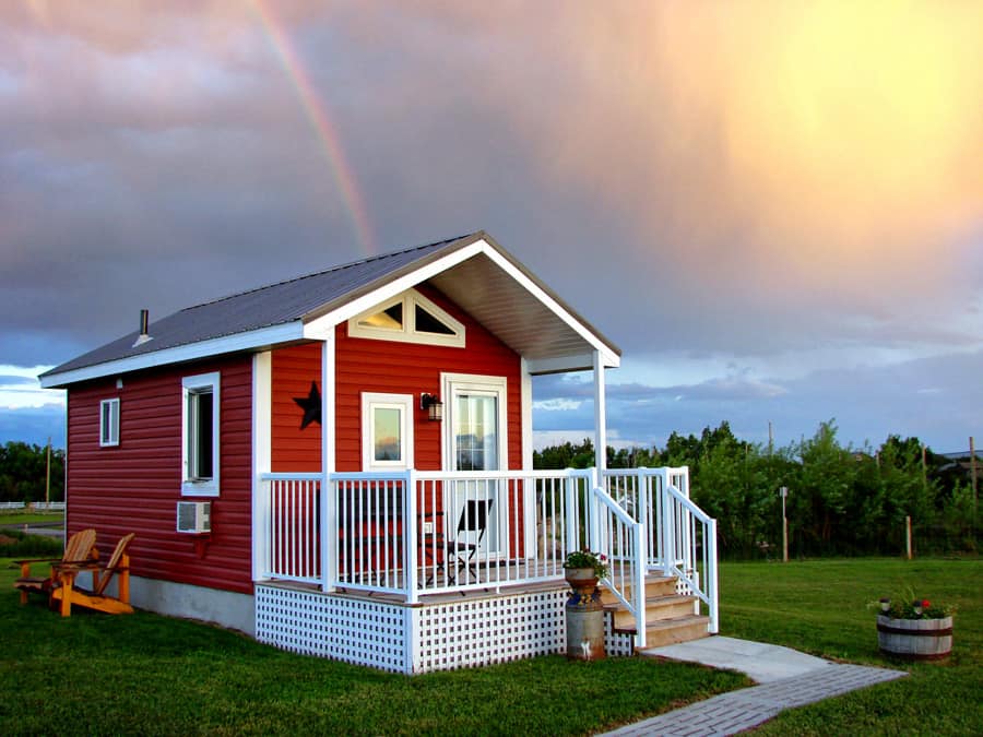 A rainbow over the Prairie Rose Cottage near Fort Macleod, Alberta.