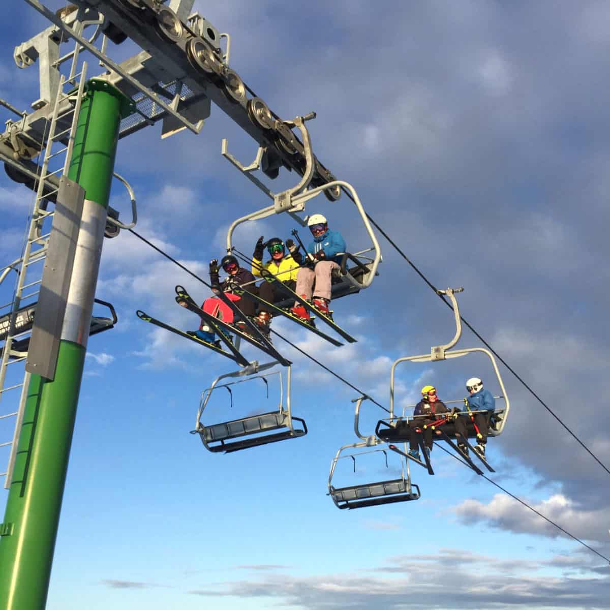Skiers on the lift at Snow Valley Ski HIll