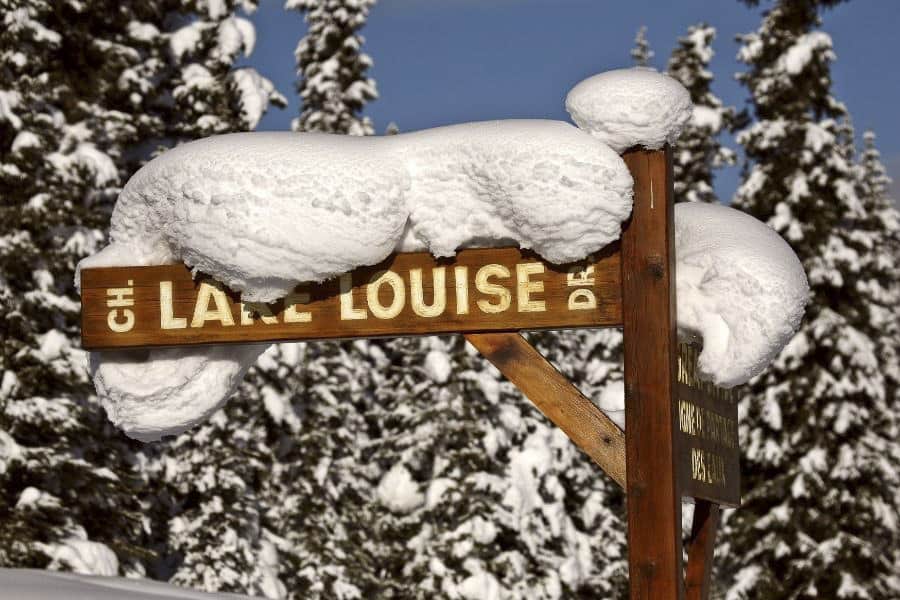 Lake Louise Sign Covered in Snow