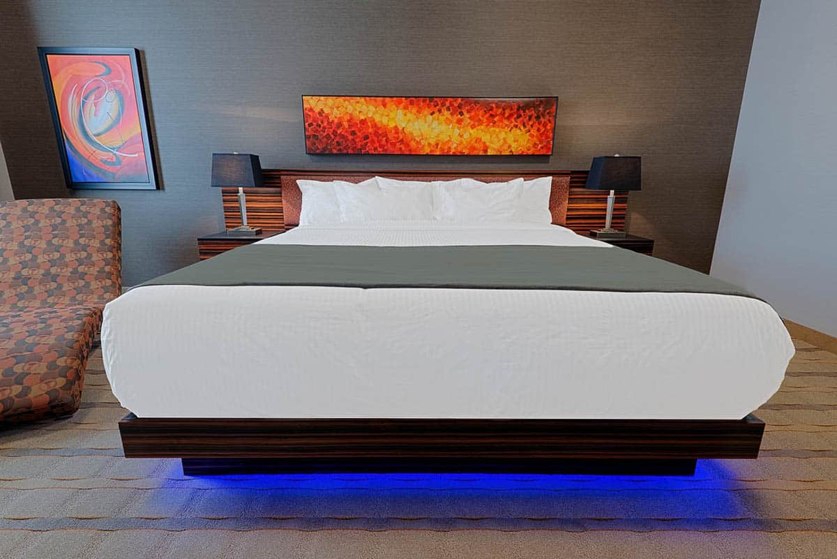 King sized bed at Hotel Clique Calgary Airport