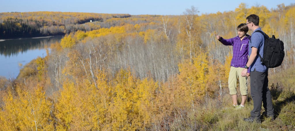 A couple hiking in the Hiking in the Athabasca river valley