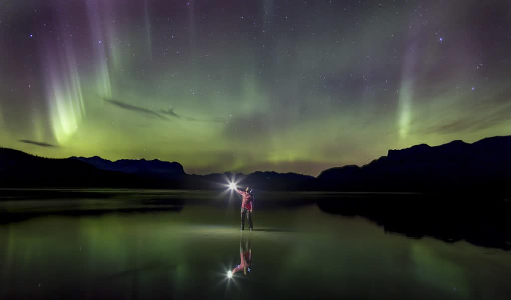 A man meets the Aurora's in Jasper National Park