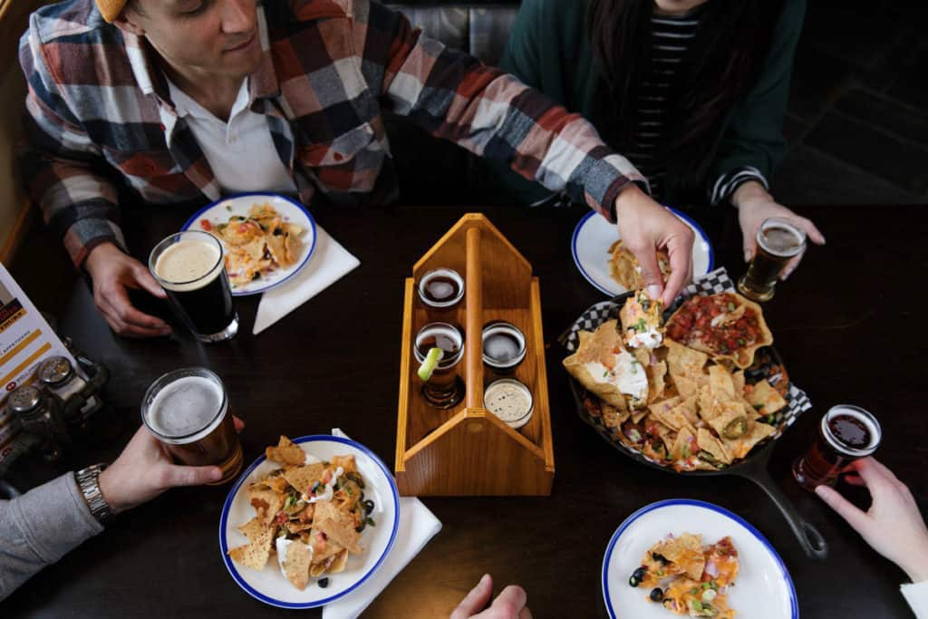 People enjoying a meal at Jasper Brewing Co