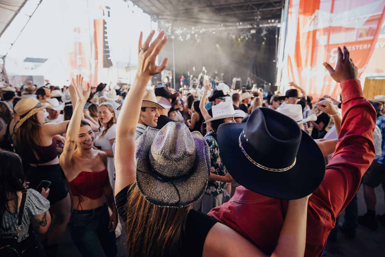 Friends party at Nashville North during Calgary Stampede