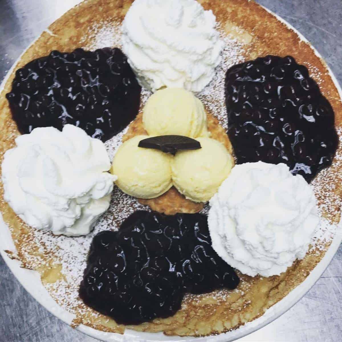 Blueberry, whip cream, and ice cream topped pannenkoek from Pfanntastic Pannenkoek Haus in Calgary.