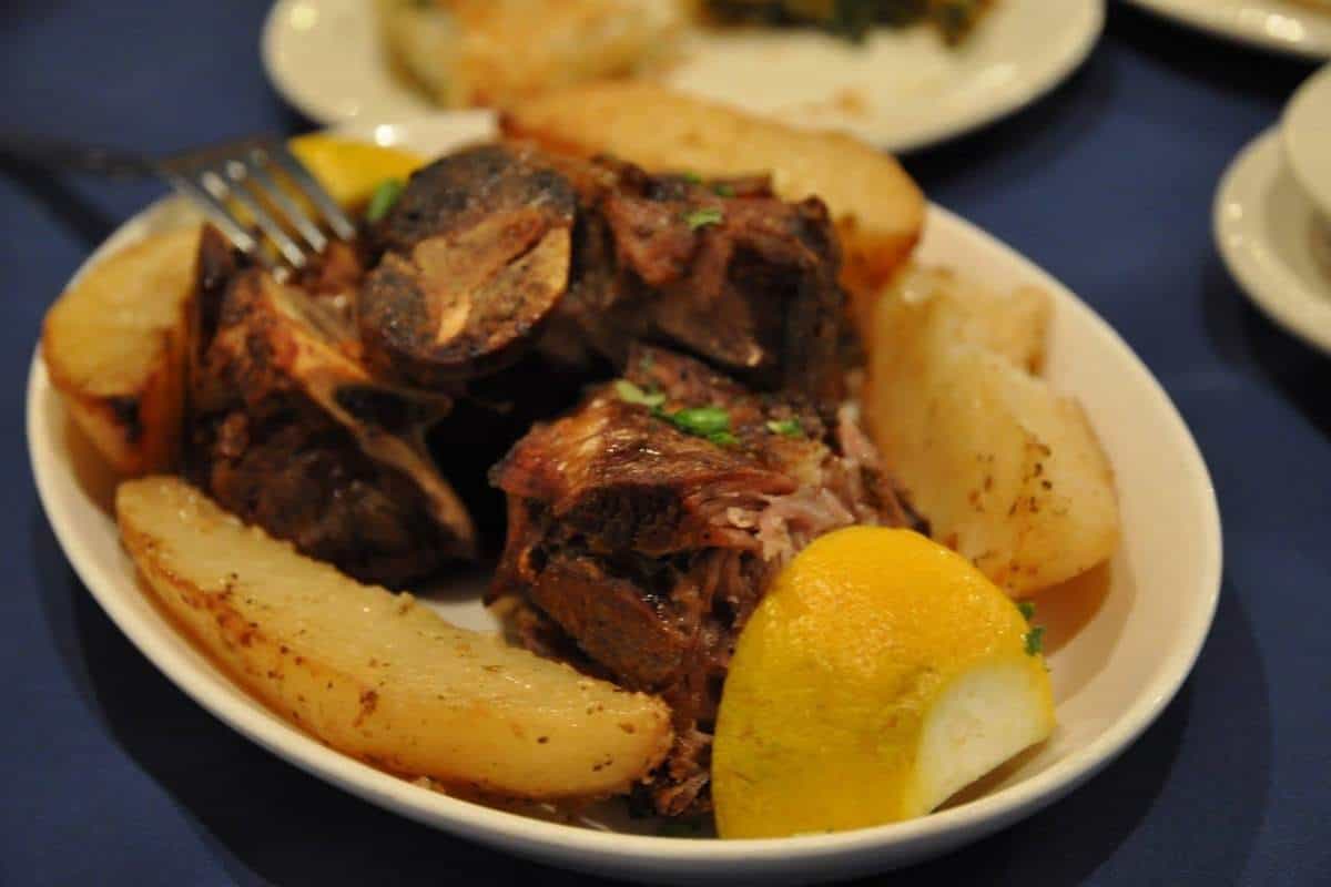 Slow roasted lamb with lemon roasted potatoes from Santorini Greek Tavern in Calgary. 