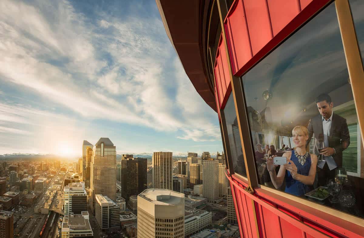A couple having dinner at Sky 360 in the Calgary Tower.