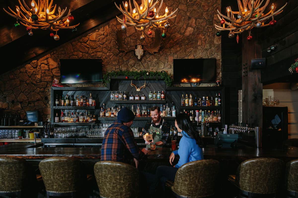 A couple enjoying a cocktail at Park Distillery