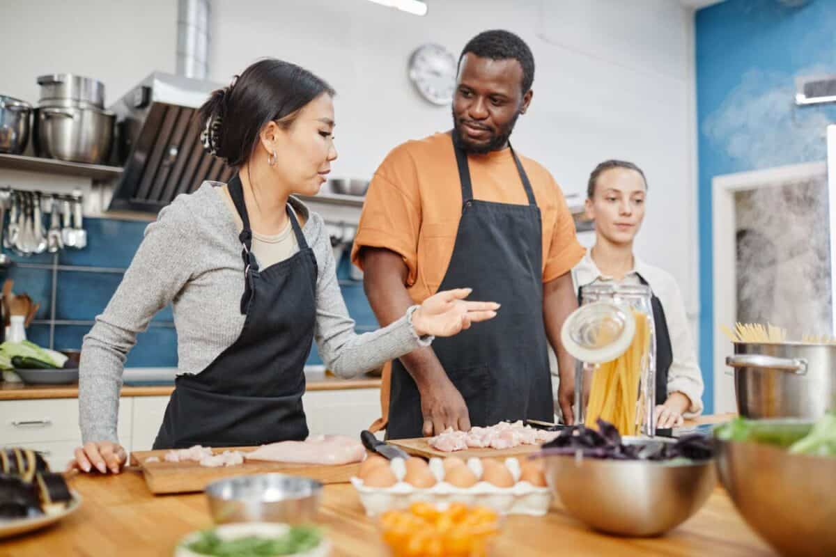 A couple taking a Calgary Cooking Class